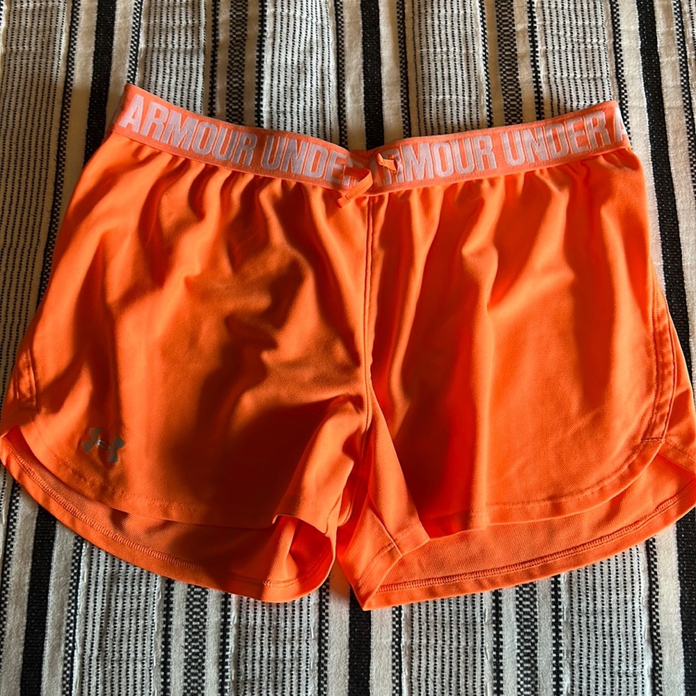 Bright orange, under armor shorts with drawstring size medium